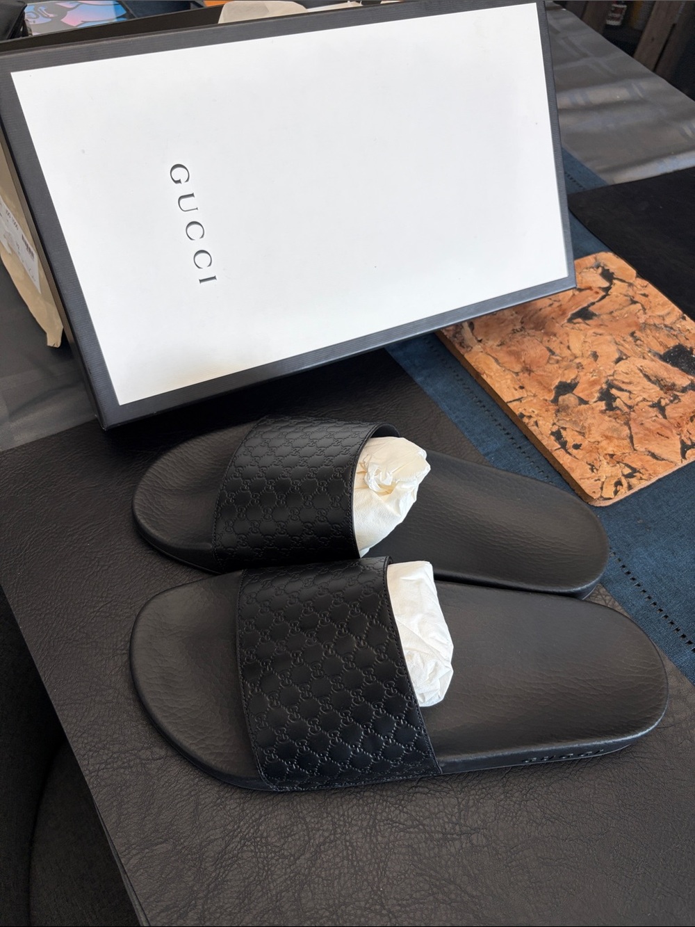 Gucci Black Embossed Logo Slide Sandals